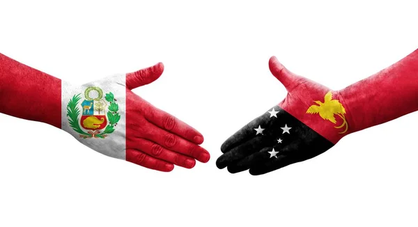 Handdruk Tussen Papoea Nieuw Guinea Peru Vlaggen Geschilderd Handen Geïsoleerd — Stockfoto