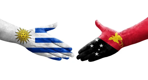 巴布亚新几内亚和乌拉圭国旗之间的握手 孤立透明的图像 — 图库照片