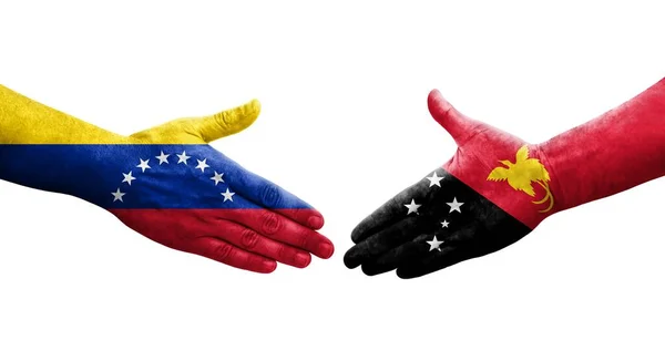 Handshake Entre Papua Nova Guiné Venezuela Bandeiras Pintadas Mãos Imagem — Fotografia de Stock