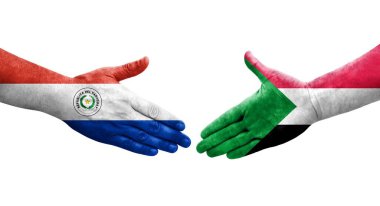 Ellerinde Paraguay ve Sudan bayrakları arasında el sıkışma, izole şeffaf görüntü.