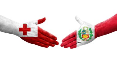 Peru ve Tonga bayrakları arasındaki tokalaşma elleri boyalı, izole şeffaf görüntü.