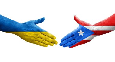 Porto Riko ve Ukrayna bayrakları arasındaki el sıkışma, izole şeffaf görüntü.