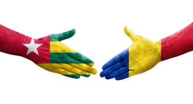 Romanya ve Togo bayrakları arasındaki el sıkışma ellerinde resmedilmiş, şeffaf bir görüntü.