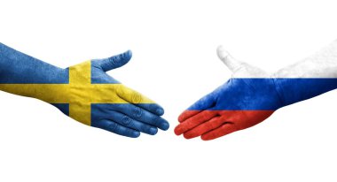 Rusya ve İsveç bayrakları arasında el sıkışma, izole şeffaf görüntü.