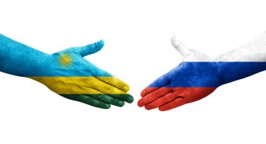 Rusya ve Ruanda bayrakları arasında el sıkışma, izole şeffaf görüntü.