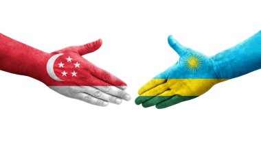 Ruanda ve Singapur bayrakları arasındaki tokalaşma elleri boyalı, izole şeffaf görüntü.