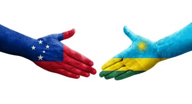 Ruanda ve Samoa bayrakları arasındaki el sıkışma ellerinde izole şeffaf görüntü.