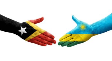 Ruanda ve Timor Leste bayrakları arasındaki el sıkışma ellerinde izole şeffaf görüntü.