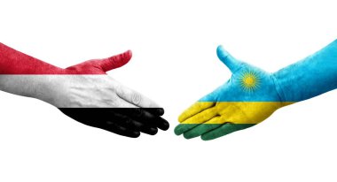 Ruanda ve Yemen bayrakları arasındaki el sıkışma ellerinde resmedilmiş şeffaf görüntü.