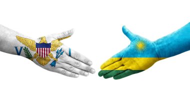 Ruanda ve Virgin Adaları arasındaki el sıkışma ellerinde boyanmış bayraklar, izole şeffaf görüntü.