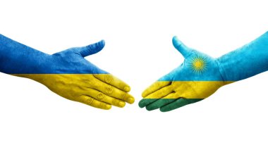 Ruanda ve Ukrayna bayrakları arasında el sıkışma, izole şeffaf görüntü.