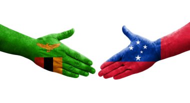 Samoa ve Zambiya bayrakları arasında el sıkışma, izole edilmiş şeffaf görüntü.