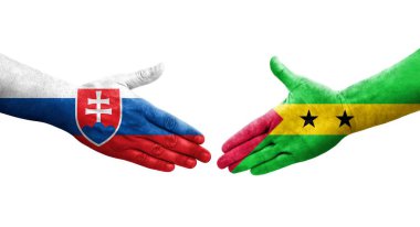 Ellerinde Sao Tome ve Principe ve Slovakya bayrakları arasında el sıkışma, izole şeffaf görüntü.