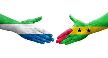 Sao Tome ve Principe arasındaki el sıkışma ve ellerinde Sierra Leone bayrakları, izole şeffaf görüntü.