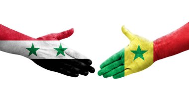 Senegal ve Suriye bayrakları arasında el sıkışma, izole şeffaf görüntü.