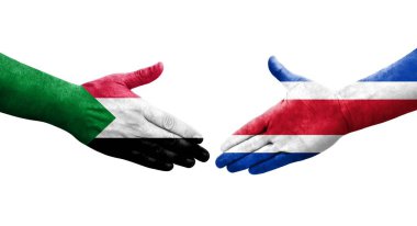 Sudan ve Kosta Rika bayrakları arasındaki el sıkışma, izole şeffaf görüntü.