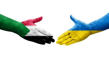 Sudan ve Ukrayna bayrakları arasında el sıkışma, izole şeffaf görüntü.