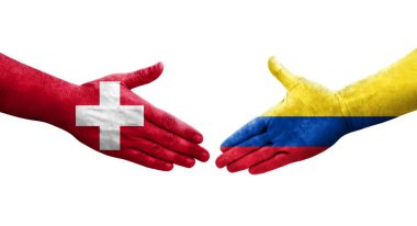 İsviçre ve Kolombiya bayrakları arasında el sıkışma, izole şeffaf görüntü.