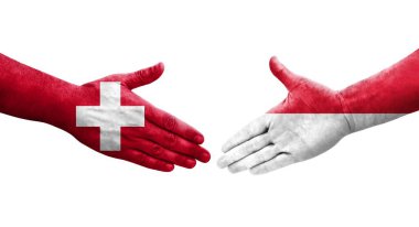 İsviçre ve Monako bayrakları arasındaki el sıkışma, izole edilmiş şeffaf görüntü.