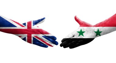 Suriye ve Birleşik Krallık bayrakları arasındaki el sıkışma, izole şeffaf görüntü.