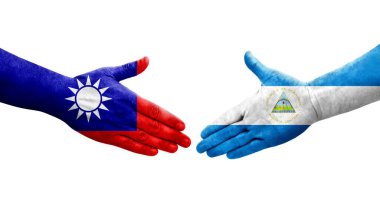 Tayvan ve Nikaragua bayrakları arasındaki el sıkışma ellerinde izole şeffaf görüntü.