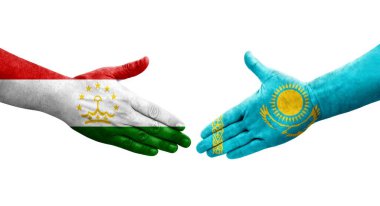 Tacikistan ve Kazakistan bayrakları arasındaki el sıkışma, izole şeffaf görüntü.