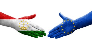 Tacikistan ve Avrupa Birliği bayrakları arasındaki el sıkışma, izole şeffaf görüntü.