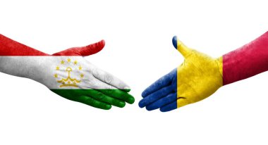 Tacikistan ve Çad bayrakları arasındaki el sıkışma ellerinde resmedilmiş şeffaf görüntü.