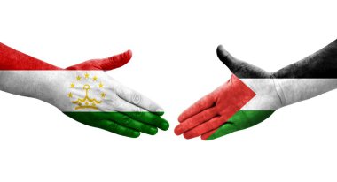 Tacikistan ve Filistin bayrakları arasındaki el sıkışma, izole şeffaf görüntü.