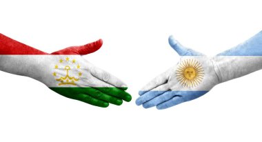 Tacikistan ve Arjantin bayrakları arasındaki el sıkışma, izole şeffaf görüntü.