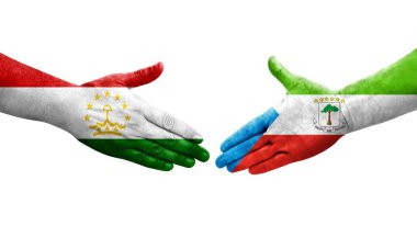 Tacikistan ve Ekvator Gine bayrakları arasındaki el sıkışma, izole şeffaf görüntü.
