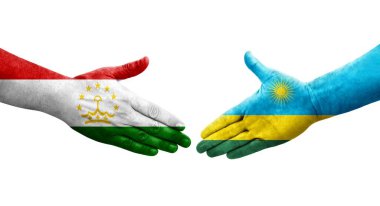 Tacikistan ve Ruanda bayrakları arasındaki el sıkışma, izole şeffaf görüntü.