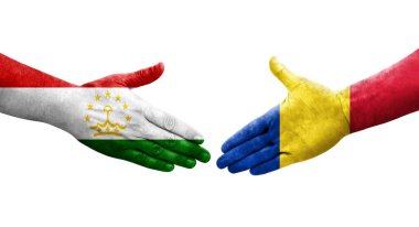 Tacikistan ile Romanya bayrakları arasındaki el sıkışma, izole edilmiş şeffaf görüntü.
