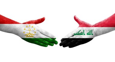 Tacikistan ve Irak bayrakları arasında el sıkışma, izole şeffaf görüntü.