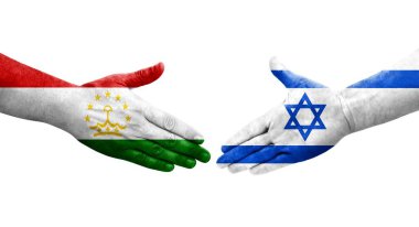 Tacikistan ve İsrail bayrakları arasındaki el sıkışma ellerinde resmedilmiş şeffaf görüntü.