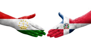 Tacikistan ve Dominik Cumhuriyeti bayrakları arasındaki el sıkışma, izole şeffaf görüntü.