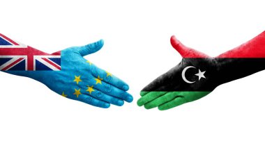 Tuvalu ve Libya bayrakları arasındaki el sıkışma, izole edilmiş şeffaf görüntü.