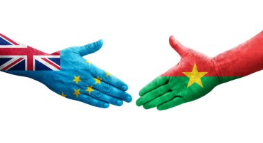 Tuvalu ve Burkina Faso bayrakları arasındaki tokalaşma elleri boyalı, izole şeffaf görüntü.