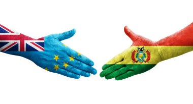 Tuvalu ve Bolivya bayrakları arasındaki tokalaşma elleri boyalı, izole şeffaf görüntü.