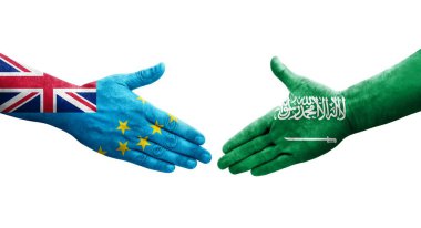Tuvalu ve Suudi Arabistan bayrakları arasındaki el sıkışma, izole edilmiş şeffaf görüntü.