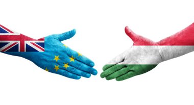 Tuvalu ve Macaristan bayrakları arasındaki el sıkışma, izole şeffaf görüntü.