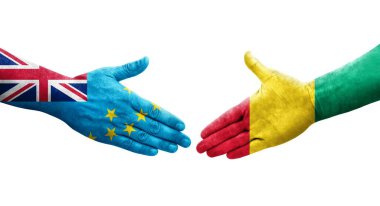 Tuvalu ve Gine bayrakları arasındaki tokalaşma elleri boyalı, izole şeffaf görüntü.