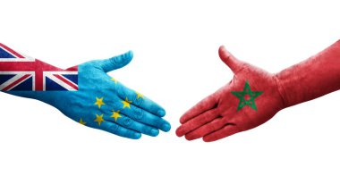 Tuvalu ve Fas bayrakları arasındaki el sıkışma, izole edilmiş şeffaf görüntü.