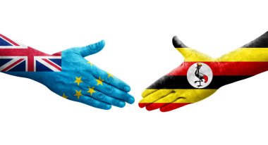 Tuvalu ve Uganda bayrakları arasındaki tokalaşma elleri boyalı, izole şeffaf görüntü.