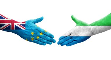 Tuvalu ve Sierra Leone bayrakları arasındaki tokalaşma elleri boyalı, izole şeffaf görüntü.