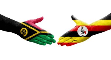 Uganda ve Vanuatu bayrakları arasındaki el sıkışma ellerinde izole şeffaf görüntü.