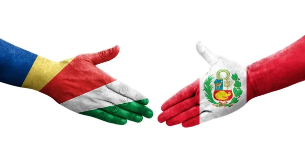 Handdruk Tussen Peru Seychellen Vlaggen Geschilderd Handen Geïsoleerd Transparant Beeld — Stockfoto