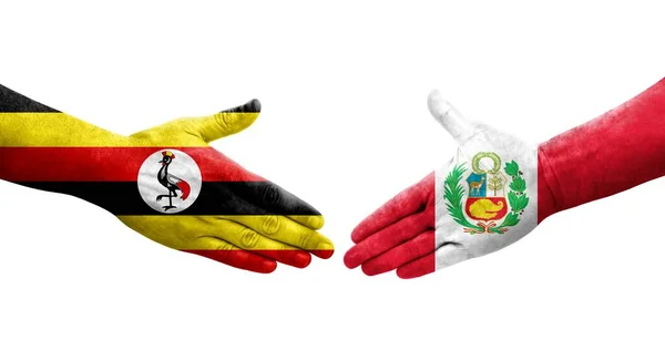 Χειραψία Μεταξύ Περού Και Ουγκάντα Σημαίες Ζωγραφισμένα Στα Χέρια Απομονωμένη — Φωτογραφία Αρχείου