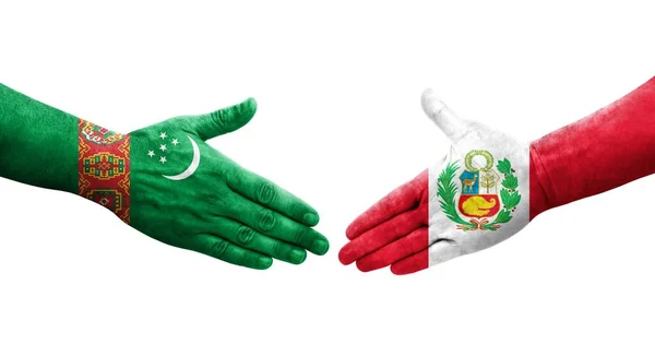 Рукопожатие Между Перу Туркменистаном Раскрашенные Руках Флаги Изолированное Прозрачное Изображение — стоковое фото