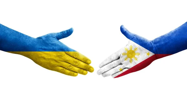 Uścisk Dłoni Między Filipinami Ukrainą Flagi Malowane Rękach Odizolowany Przezroczysty — Zdjęcie stockowe